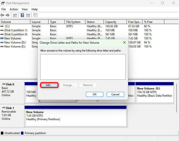 Adding a new drive letter using the Disk Management console.